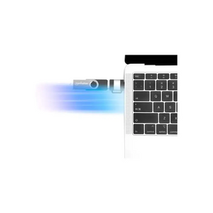 USB-C adapter connected to laptop keyboard showing blue data transfer visualization with Manhattan branding on silver connector