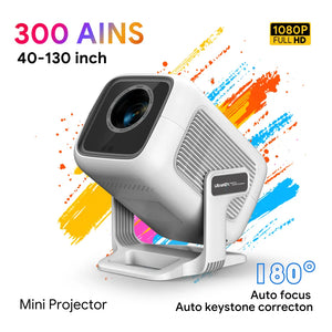 White mini portable projector with black lens and ribbed cooling vents, displaying 1080P Full HD resolution, 300 ANSI lumens, 40-130 inch projection range, 180 degree auto focus and keystone correction, surrounded by colorful orange yellow and blue paint splash effects on white background