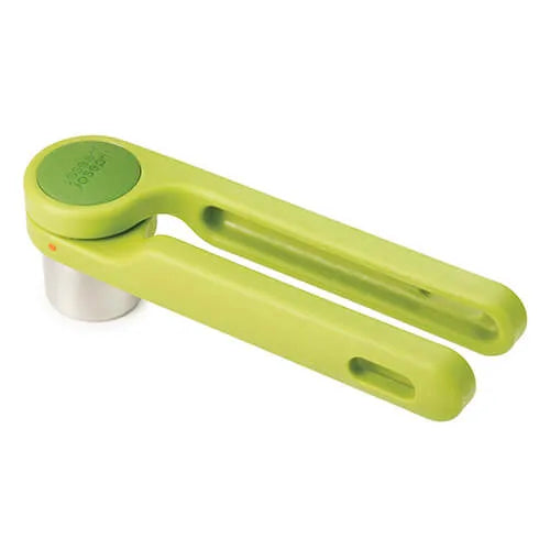 Joseph Joseph Helix Garlic Press in lime green with white chamber, angled view showing lever design and ergonomic handle