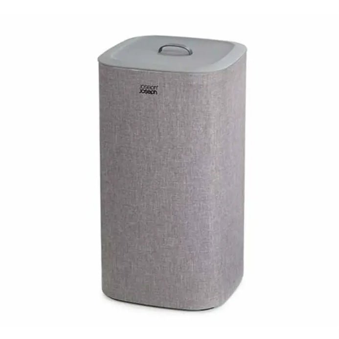 Joseph Joseph Tota 60 litre grey fabric laundry basket with rounded corners and grey lid featuring handle