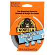 Gorilla Double-Sided Tape 35mm x 7.3m packaging with orange and blue label featuring gorilla logo, suitable for securing items to smooth and rough surfaces indoors and outdoors