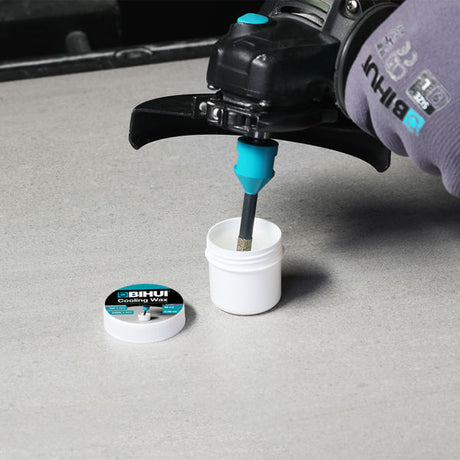 Bihui Cooling Wax 50ml product shot showing white jar with black and teal label, applicator brush with turquoise handle being dipped into open container, and purple Bihui branded bottle in background on grey surface