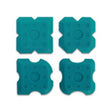 Four teal silicone applicator stamps from the Bihui 4 Piece Silicone Applicator Set 320C, each with a quatrefoil shape and circular center pad, arranged in a 2x2 grid
