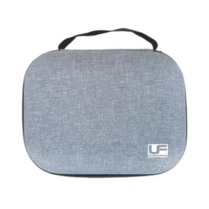 Grey fabric carrying case with black handle and UF logo for Urban Fitness massage gun storage and transport