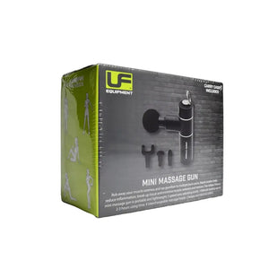 Urban Fitness mini massage gun in black with carry case and interchangeable massage heads displayed in green and grey retail packaging