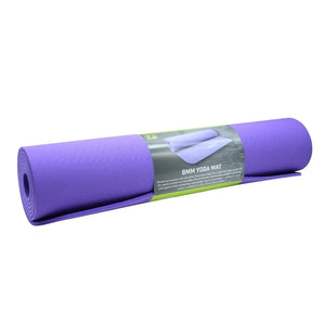 Purple 6mm thick yoga mat rolled up in packaging by Urban Fitness, showing product label and specifications on gray and green band wrapper