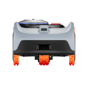 Segway Navimow i206 AWD robotic lawn mower rear view showing white and black body with orange treaded wheels, blue light bar, and red safety beacon on top, designed for 600 square meter coverage areas