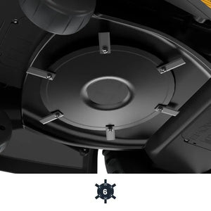 Close-up of a black circular component with six metallic tabs on a white background