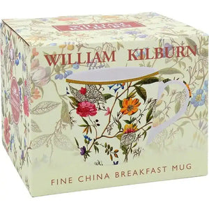 William Kilburn fine china breakfast mug in cream with colorful botanical floral design featuring roses, orange flowers and blue blooms on branches, displayed in branded packaging box