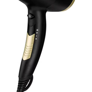 TRESemme Salon Professional 2200W black hairdryer with gold accents, diffuser attachment and heat settings displayed on handle against white background