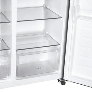 Interior view of Candy frost-free American fridge freezer showing empty white shelves with black trim, clear glass drawers, and stainless steel finish