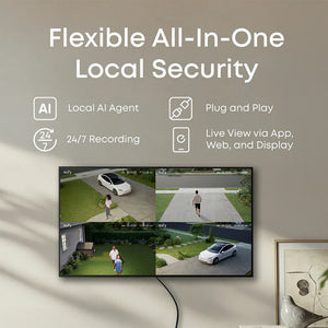 Smart home security system display with video feeds on a wall.