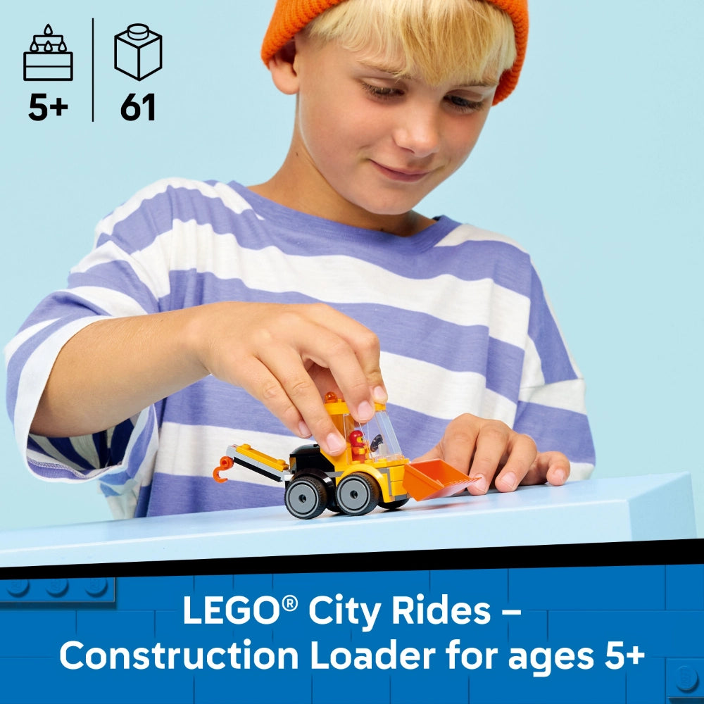A young child wearing a blue and white striped shirt and orange beanie playing with a yellow and black LEGO City construction loader vehicle on a light blue surface against a blue background, with age rating 5+ and 61 pieces shown in top left corner