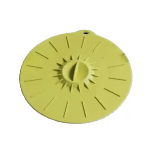 Yellow silicone suction lid with radial ridge pattern and central suction cup for food storage