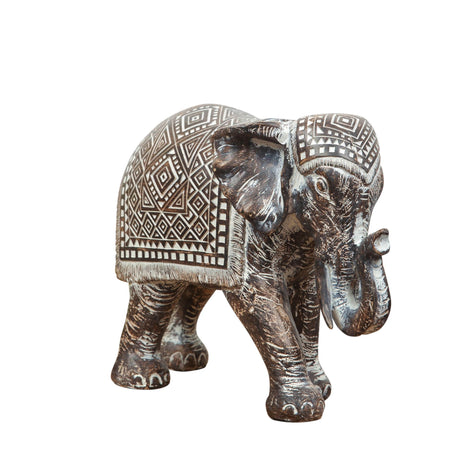 Decorative elephant figurine with intricate patterns on a white background