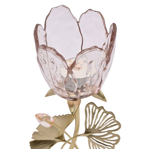 Hestia single stem candle holder featuring blush pink glass flower-shaped top with textured petals on gold metal base with decorative leaf details