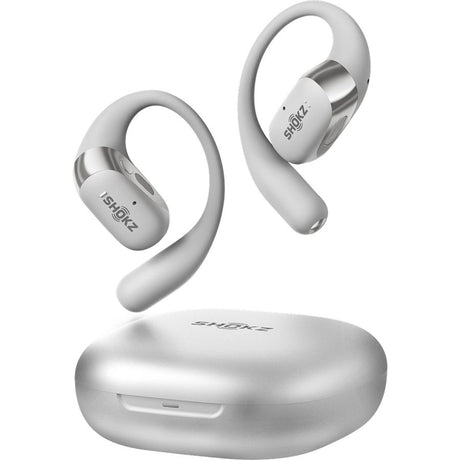 Shokz OpenFit 2+ open ear wireless earbuds in grey and silver with charging case, showing two earpieces with curved ear loops and metallic accents displayed above a rounded pearl grey charging case