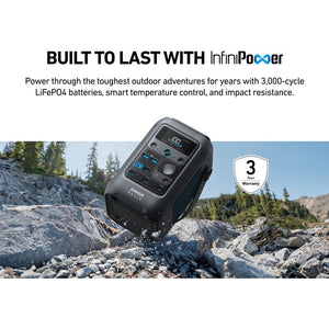 Anker Solix C300X portable power station with InfiniPower technology displayed on rocky outdoor terrain with forest background, featuring black rugged design, digital display, blue control buttons, and 3-year warranty badge