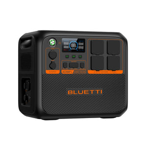 Bluetti AC200PL portable power station with 2400W output and 2304Wh capacity, featuring black rugged casing with diagonal carbon fiber pattern, orange accents, digital display screen, multiple control buttons, four AC outlets on right side, and dual power input ports on left side