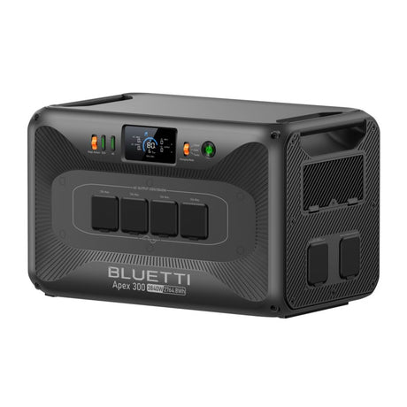 Bluetti Apex 300 portable power station with 3840W capacity in dark gray with carbon fiber textured finish, featuring digital display panel, four AC output sockets, side ventilation grilles, and status indicator lights on top