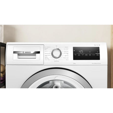 Bosch Series 4 white front-load washing machine with 8kg capacity, featuring a large circular door, analog dial control, digital display showing 4:25, and Eco Silence Drive technology