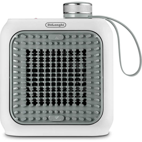 DeLonghi Capsule Desk 360W Ceramic Fan Heater in white and sage green with grey heating grille and top-mounted air outlet control knob