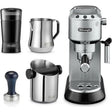 DeLonghi Dedica pump espresso machine bundle pack in stainless steel and black, including portafilter, milk frother pitcher, tamper, knock box, and single-serve coffee maker with control panel and steam wand
