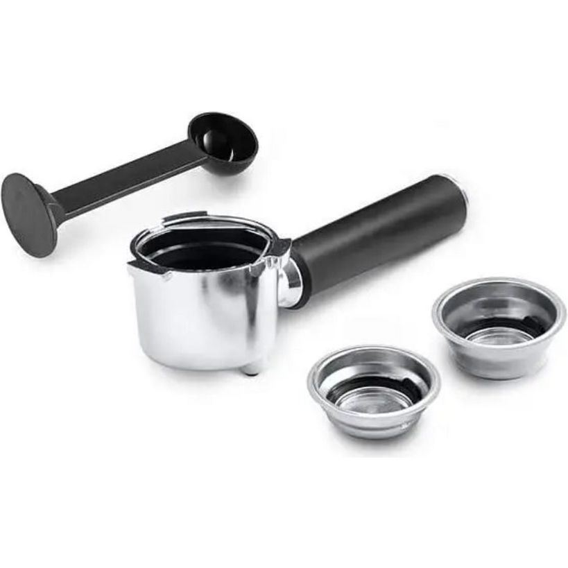 DeLonghi Dedica pump coffee machine bundle pack showing stainless steel milk frother with black handle, measuring scoop, and two metal filter baskets on white background