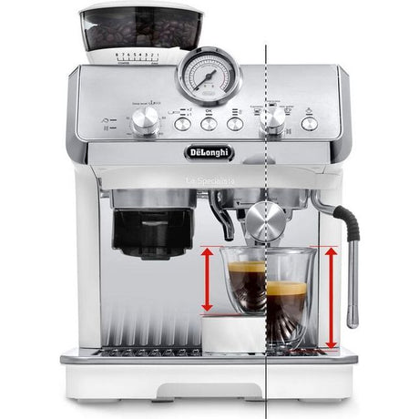 DeLonghi La Specialista Arte white bean to cup coffee machine with integrated grinder, pressure gauge, control panel, and dual espresso cups showing coffee extraction with red measurement arrows