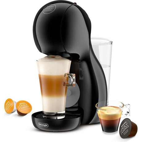 Delonghi Nescafé Dolce Gusto Piccolo XS black pod coffee machine with water reservoir, displaying a tall glass of layered cappuccino, espresso cup, water glass, and Dolce Gusto coffee capsules included in the value bundle