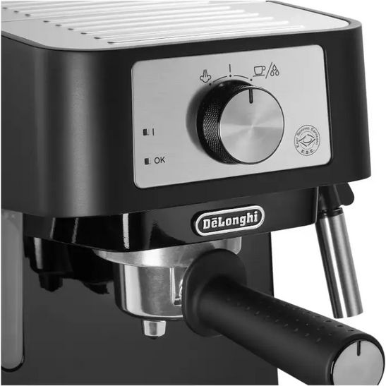DeLonghi Stilosa black espresso coffee machine with stainless steel portafilter, rotary dial control, and power buttons on white and black panel