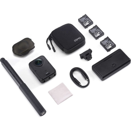 DJI Osmo 360 II Adventure Combo contents laid out including compact black camera with dual lenses, carrying case, three batteries, microphone, USB cable, lens protector and cleaning cloth