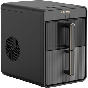 Dreame Aura Bullet Ice Machine Maker IB-50 in black with vertical ribbed panel design, featuring a circular ventilation grille on the left side and a handle on the front, shown against a white background