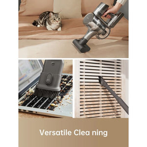 Dreame R20 cordless stick vacuum in silver demonstrating versatile cleaning capabilities on beige sofa with tabby cat, laptop keyboard, and ventilation slats with various brush attachments