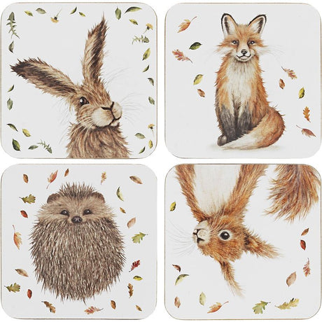 Set of four cork-backed coasters featuring watercolor woodland animals with autumn leaves, including a brown hare, red fox, hedgehog, and rabbit in natural earth tones on cream background