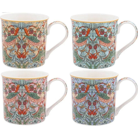 Set of four ceramic mugs featuring William Morris Strawberry Thief pattern with red strawberries, green leaves, blue birds and ornate floral design on cream background with gold rim and white handles