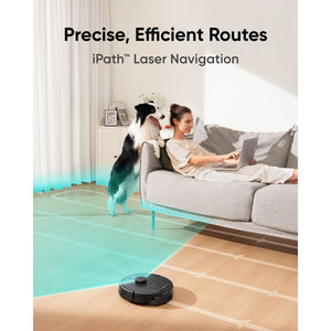 eufy L60 Hybrid iPath laser navigation cleaning a living room while a woman relaxes on the sofa with her dog