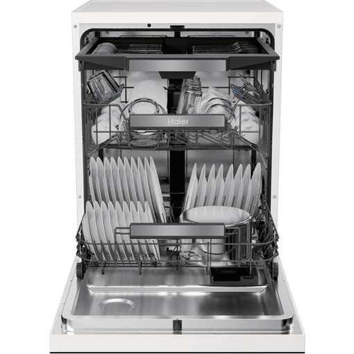 Haier I Pro Shine Series 3 white freestanding dishwasher with door open showing stainless steel interior, multiple place settings loaded on racks, and Haier branding visible