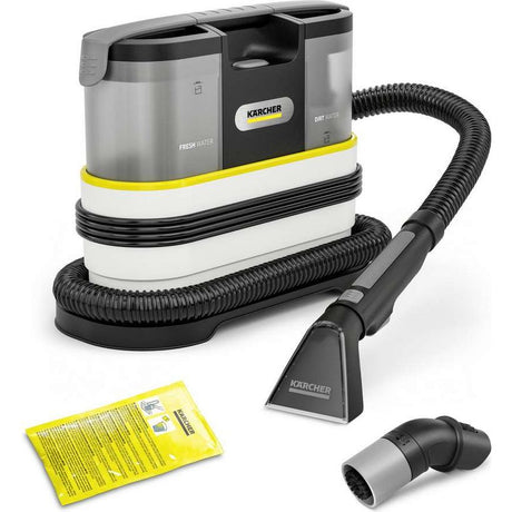 Karcher SE 2 Spot Care carpet cleaner with dual water tanks (fresh and dirty), black hose, upholstery attachment tool, and yellow instruction manual on white background