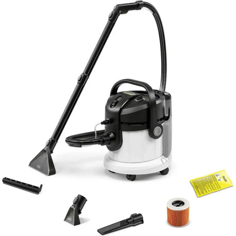 Kärcher SE4 Select carpet cleaner vacuum with white and black body, flexible hose attachment, floor brush tool, upholstery nozzle, crevice tool, and orange replacement filter cartridge displayed against white background
