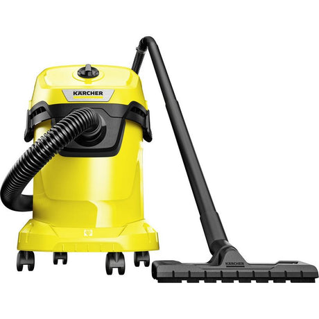 Kärcher WD 3 wet and dry vacuum cleaner with bright yellow and black cylindrical tank, black hose attachment, and floor cleaning head accessory on white background