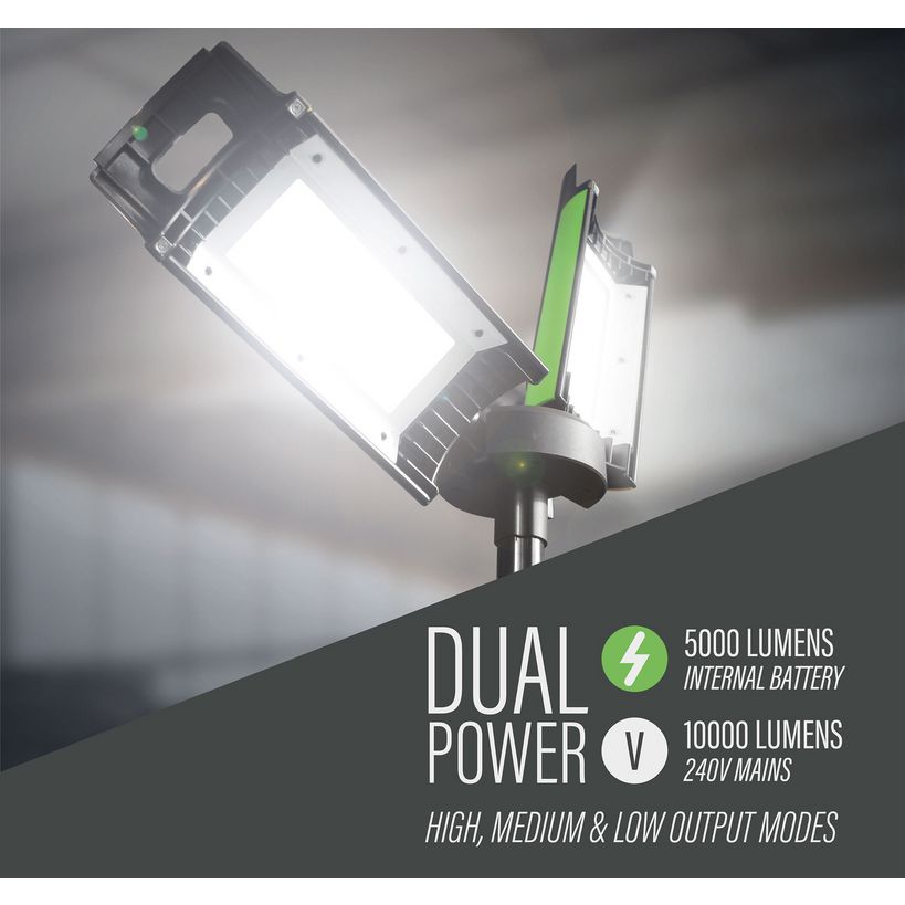 Lighthouse dual power rechargeable site light on stand with green accents showing 5000 lumens internal battery and 10000 lumens 240V mains power modes, featuring high medium and low output settings against cloudy sky background