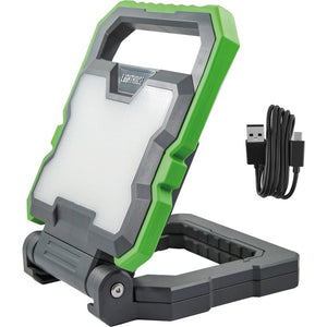 Lighthouse rechargeable LED worklight with 2000 lumens bright white panel, featuring bright green and dark gray plastic housing, adjustable stand base, and black USB charging cable with Lightning connector