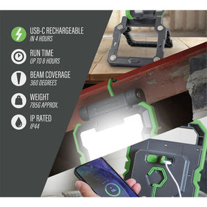 Lighthouse rechargeable LED worklight with 2000 lumens displayed in use illuminating a dark workspace, showing green and black design with specifications including USB-C charging, 8-hour runtime, 360-degree beam coverage, IP44 rating, and approximately 785g weight, alongside smartphone control display