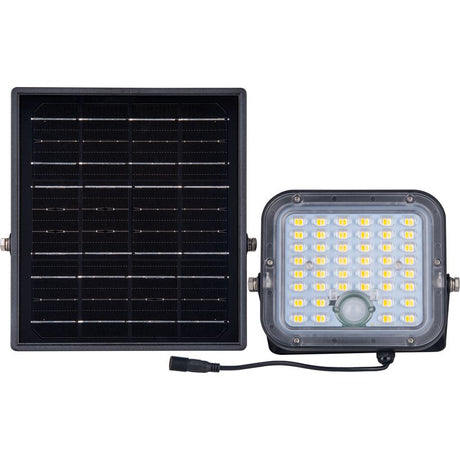 Luceco Mensa black solar powered LED floodlight with PIR motion sensor showing large solar panel on left and rectangular light unit with yellow LEDs and grey lens on right connected by black cable