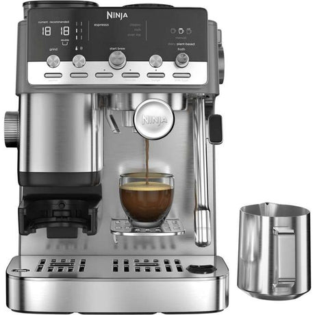 Ninja Luxe Café Mini Plus Espresso Coffee Machine ES352UK in stainless steel with digital display showing brew settings, featuring a compact design with milk frother attachment and cup dispenser