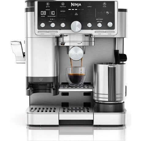 Ninja Luxe Café Pro Series stainless steel espresso machine with black control panel, featuring digital display, multiple brewing options, integrated milk frother, and drip tray, photographed against white background