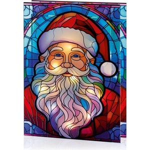 Stained glass style LED table top decoration featuring Santa Claus face with red hat, white beard, and glasses against blue background with colorful mosaic tile pattern design, battery operated festive Christmas ornament