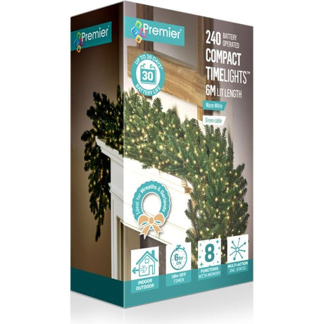 Premier 240 LED battery operated compact timelights with warm white lights on 6m length, displayed on decorative green garland and wreath with timer function and multi-action settings on product packaging box