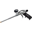 Roughneck expanding foam gun with chrome metal barrel and black plastic trigger handle, featuring a brass nozzle tip and black comfort grip